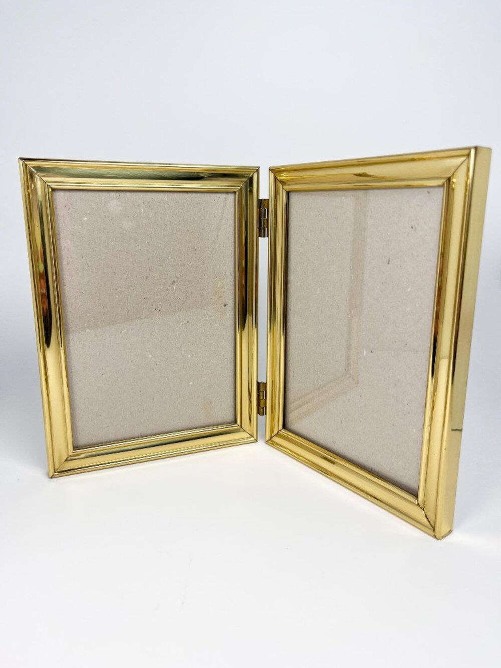 Vintage brass double folding frame - 5 x 7" photos